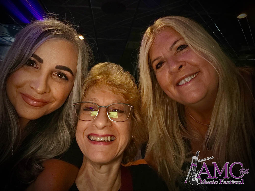 Photos from Valerie Pepe’s AMC Fall Music Festival at Rab’s Country Lanes in Staten Island featuring smiling attendees, members of the AMC Community, Valerie, guests gathered for the event, and bands performing live music on stage in support of AMCSI.
